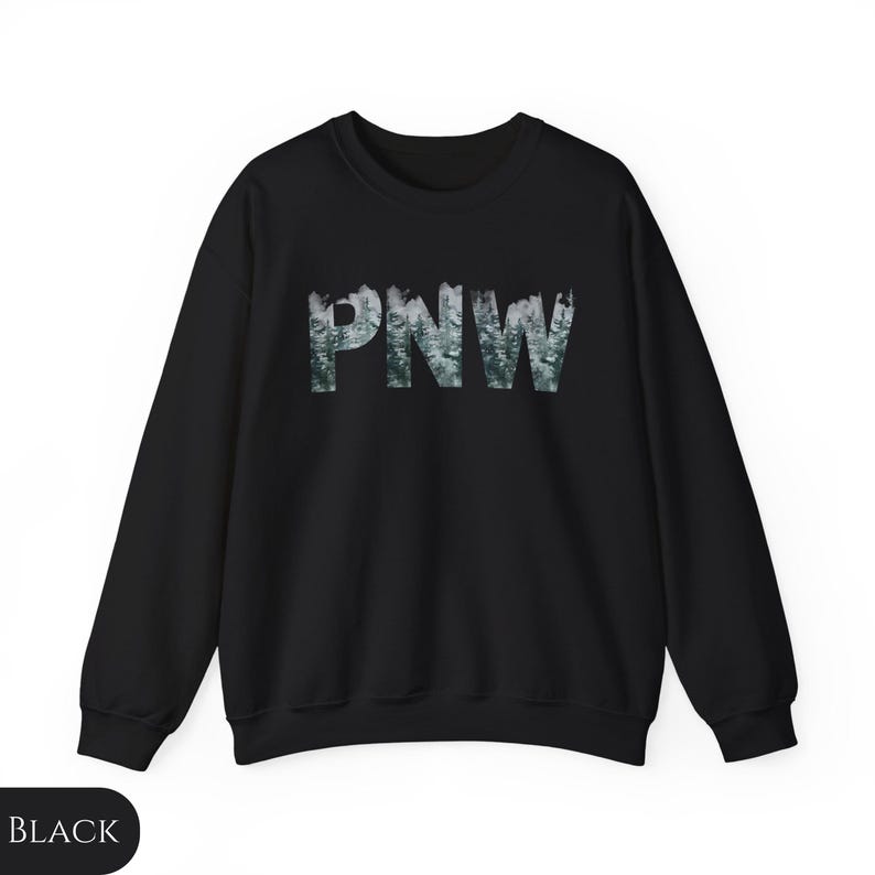 May include: Black sweatshirt with a forest-themed graphic of the letters "PNW" in white.