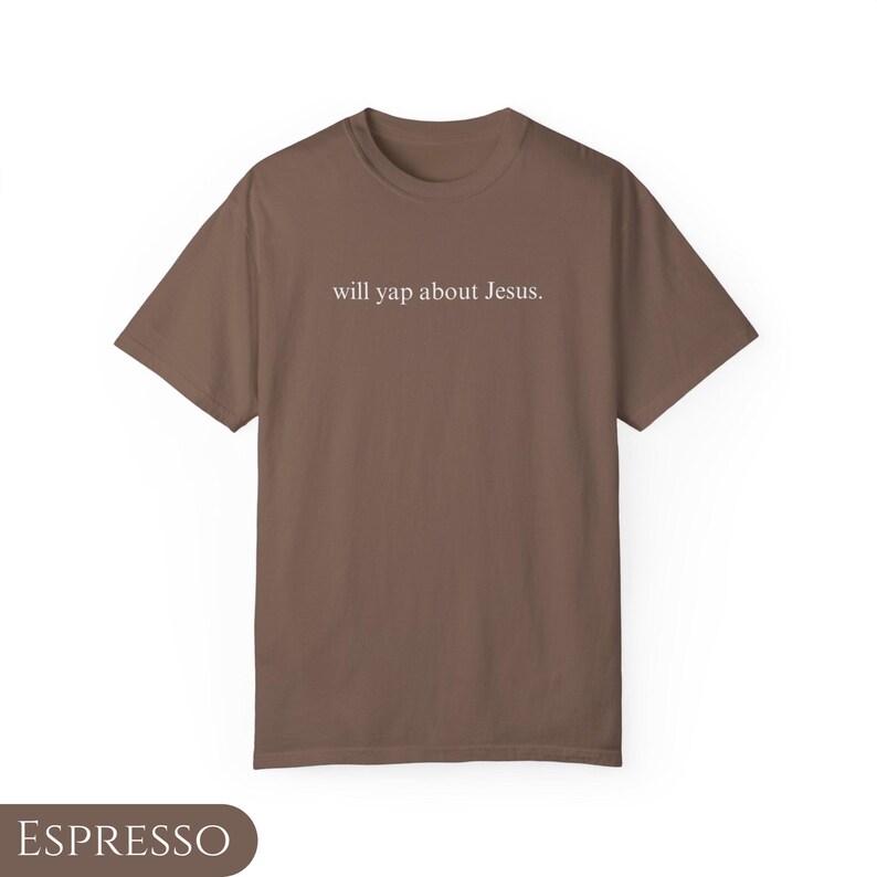 May include: A brown t-shirt with the text "will yap about Jesus." printed in white on the front.