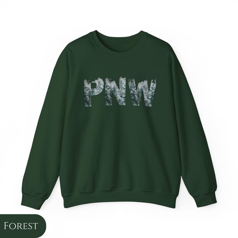 May include: A dark green sweatshirt with the text "PNW" in white letters. The letters are made up of a forest scene.