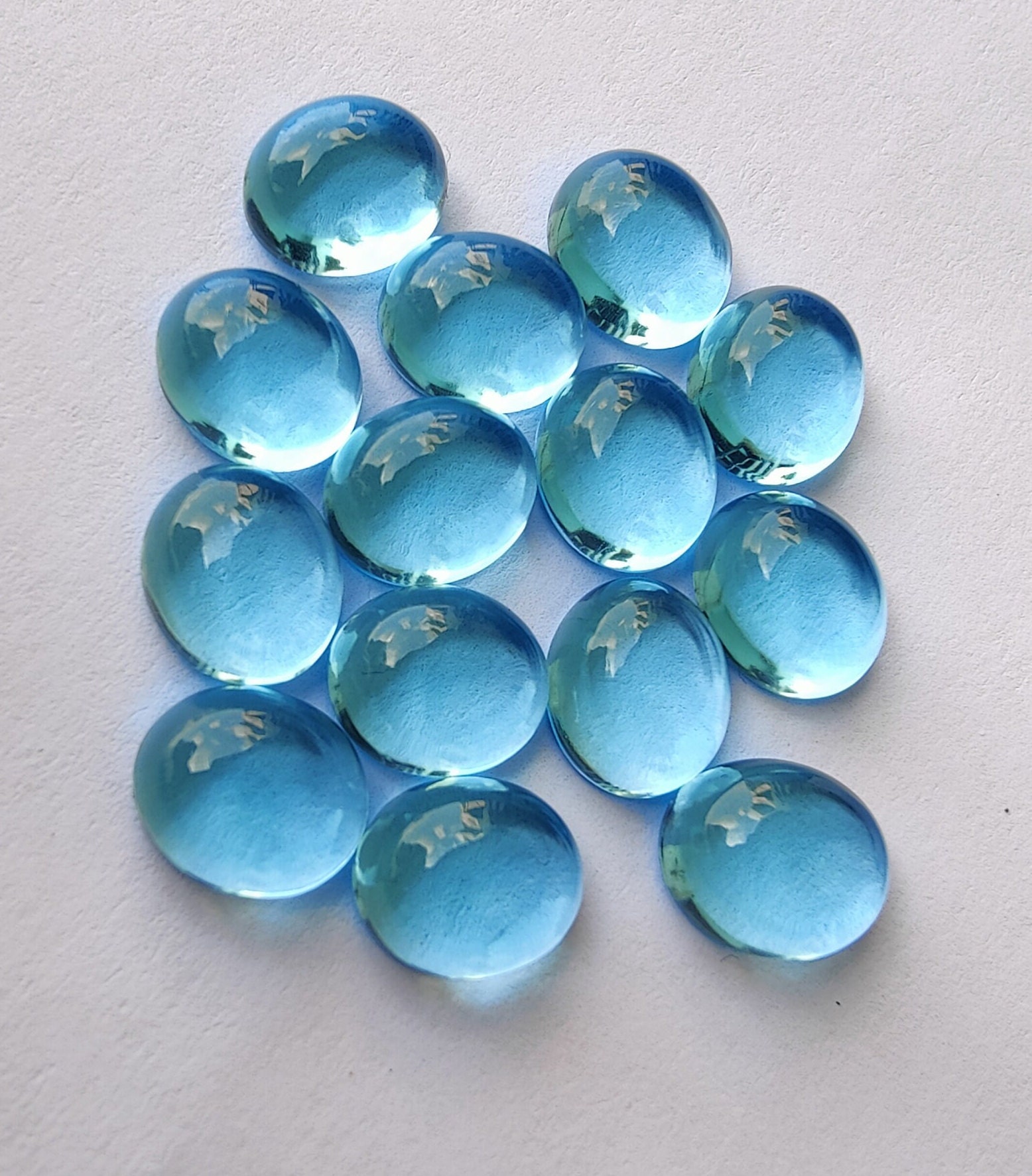 AAA+ Swiss Blue Quartz Cabochon: Natural Oval Calibrated Gemstone