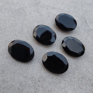 AAA+ Black Onyx Gemstone: Oval Faceted Cut, Calibrated Sizes
