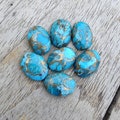 Blue Copper Turquoise Cabochon: Oval Flat Back Gemstone product logo