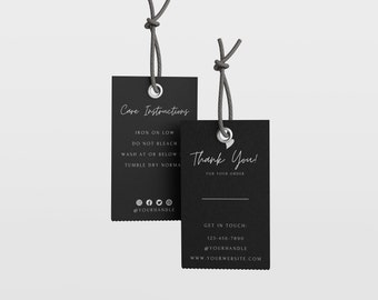 May include: Two black rectangular tags with white text. The first tag has care instructions for a garment, including instructions to iron on low, do not bleach, wash at or below, and tumble dry normal. The second tag says "Thank You!" for your order and includes contact information with a phone number, social media handle, and website address.