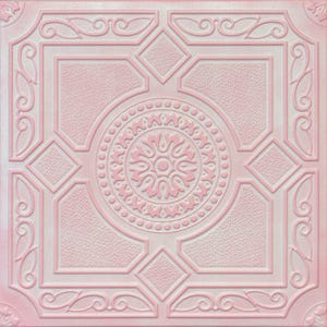 May include: A square, pink and white decorative tile with an embossed geometric pattern. The design features a central floral medallion, surrounded by diamond and rectangular shapes, and decorative scrollwork.