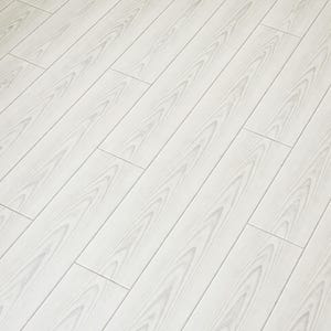 May include: Diagonal view of light gray wood flooring with a subtle wood grain pattern. The planks are rectangular and arranged in parallel lines, creating a clean and modern aesthetic. The color is a soft, neutral tone.