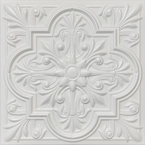 May include: A square, white, decorative ceiling tile with a raised, ornate floral design. The pattern features a central flower, surrounded by symmetrical, swirling leaves and rounded shapes. The tile has a textured surface.