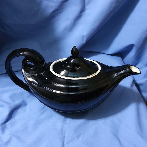Vintage Black Aladdin/Genie with rare oval opening