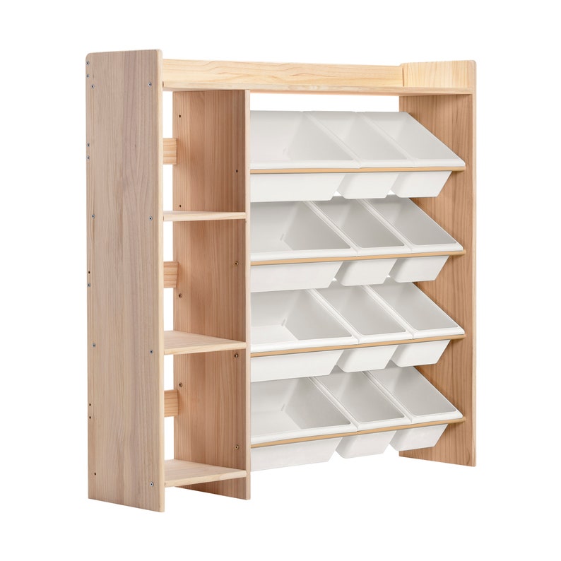 May include: A wooden toy organizer with multiple white plastic bins. The organizer has a light wood frame with open shelves on the left side. The bins are arranged in angled rows, providing ample storage space for toys and other items.