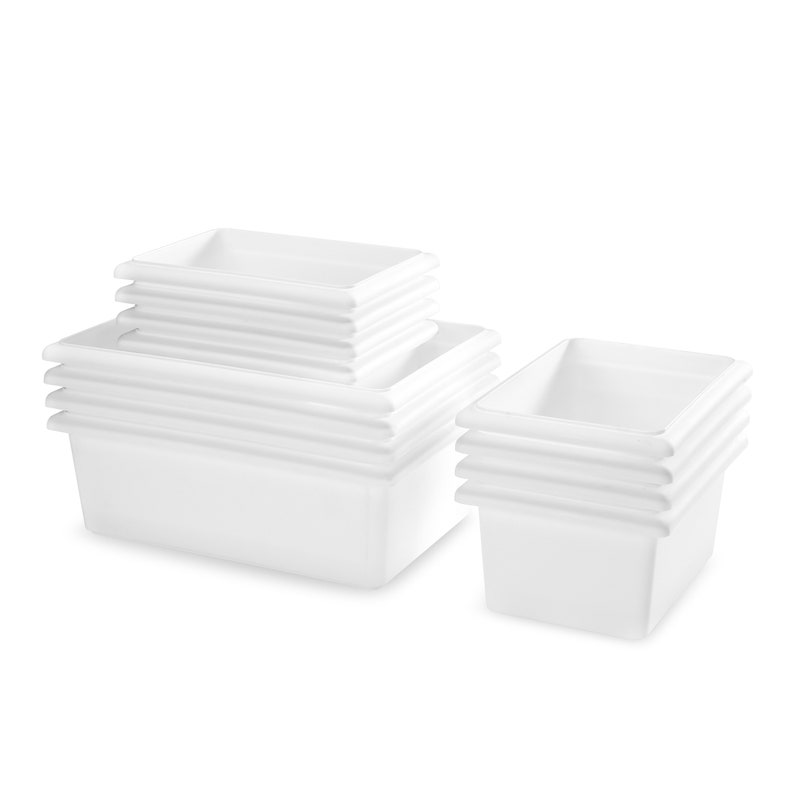 May include: Several white rectangular storage containers of varying sizes are stacked together. Each container has a square top and a series of horizontal ridges around the sides. The containers are made of a smooth, solid white material.