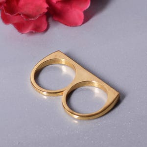 Stylish Golden Double Finger Ring – Modern Statement Jewelry for Women&quot;