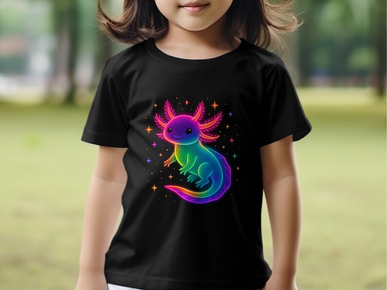 May include: Black t-shirt with a colourful axolotl illustration. The axolotl is rendered in rainbow colours, with a smiling expression and star accents. The shirt is made of a soft material and is suitable for children.
