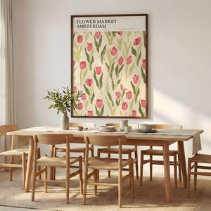 Spacious, bright dining room featuring a large framed Amsterdam flower market tulip print hanging on the far wall.