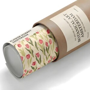 Rolled pastel floral design poster showing the Amsterdam pink tulip pattern inside a cardboard shipping tube.