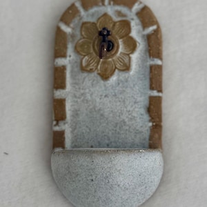 fuente de pared en miniatura