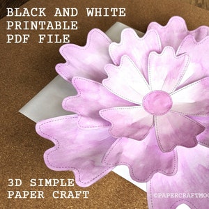 Puede incluir: Plantilla de flor de papel artesanal 3D imprimible en blanco y negro. La flor está hecha de múltiples capas de pétalos y tiene un efecto acuarela rosa. El texto "BLACK AND WHITE PRINTABLE PDF FILE" y "3D SIMPLE PAPER CRAFT" es visible en la imagen.