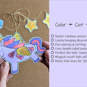 May include: A colourful unicorn mobile with a rainbow and stars. The unicorn is purple with a yellow horn, pink hearts, and wings. The text on the right says "Color -> Cut -> Glue".