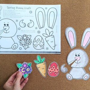 May include: A Spring Bunny Craft kit with a printed template and cut-out pieces. The template includes a bunny outline, ears, hands, flowers, an egg, and a carrot. The cut-out pieces are colored and ready to assemble.