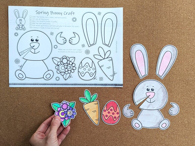 May include: A Spring Bunny Craft kit with a printed template and cut-out pieces. The template includes a bunny outline, ears, hands, flowers, an egg, and a carrot. The cut-out pieces are colored and ready to assemble.