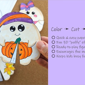 May include: A paper craft featuring a cartoon ghost holding an orange pumpkin. The ghost wears a purple and orange hat. The image includes the text "Color -> Cut -> Glue" and bullet points describing the craft's features.