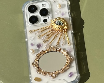 iPhone-skal i hartsdesign, estetiskt iPhone-skal för iPhone 17 16 15 14 13 12 11 pro max plus mini-skal, gyllene öga med spegelblank pärla