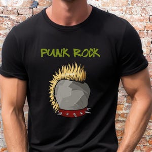 May include: Black t-shirt with a graphic of a punk rock mohawk with the text "Punk Rock" printed on the front.