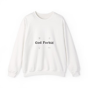 May include: A white sweatshirt with the text "God Forbid" in black, centered on the front. The design includes small, simple illustrations above and below the text, adding a minimalist touch to the casual apparel.
