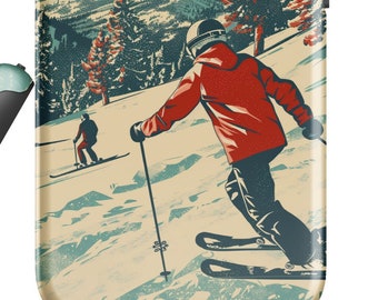 May include: A phone case with a retro-style illustration of a skier on a snowy mountain slope. The case features a blue, green, and white color scheme with a vintage feel.