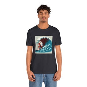 Cool Surfing Santa Unisex Tee, Christmas Santa Shirt, Beach Santa T-shirt, Holiday Surf Shirt, Funny Santa Tee