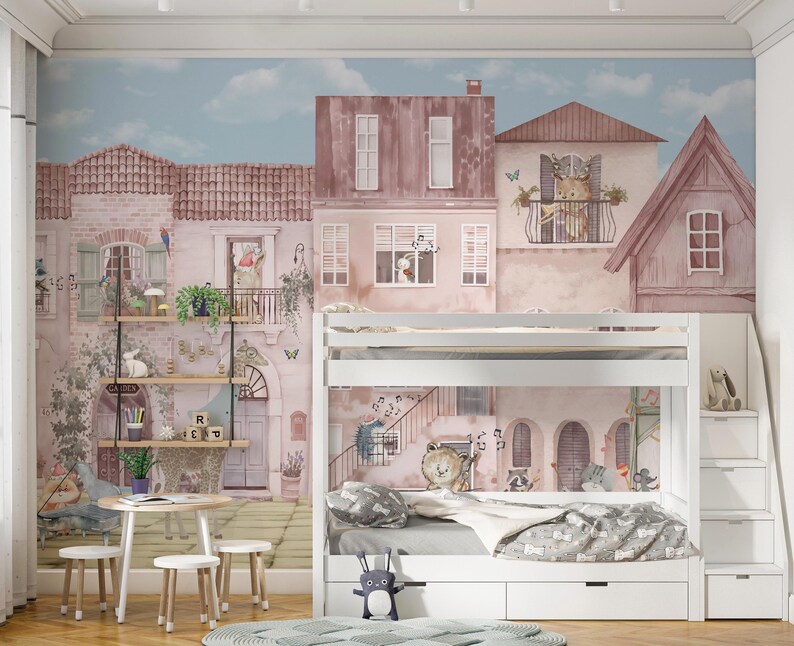 This wall mural is shown in a shared kids' bedroom featuring a white bunk bed and wooden shelving. The watercolor European cityscape serves as a peaceful backdrop, with the textured canvas material adding depth to the room's decor. The placement illustrates how the animal motifs remain visible around bedroom furniture.