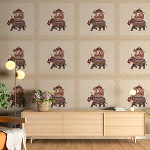 May include: A beige wallpaper with a repeating pattern of elephants carrying a decorated canopy with people inside. The wallpaper is in a living room setting with a wooden cabinet, a lamp, and a potted plant.