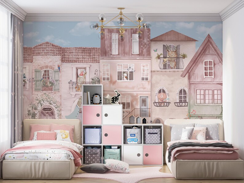 A wall mural featuring the musical animal village installed in a spacious twin bedroom with pink and grey bedding. The design is centered behind a white modular toy organizer, showing its versatility for large wall surfaces. The soft pastel colors create a calm yet playful environment for a children's sleeping area.