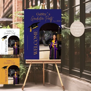 May include: A welcome sign for a graduation party with a blue background, gold lettering, and a photo of a graduate in a purple cap and gown. The text on the sign reads "Gabby's Graduation Party Class of 2024" and "Welcome" with the date "May 24, 2024".