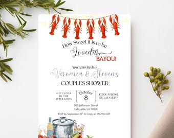 May include: A white invitation card with watercolor illustrations of crawfish, cooking pots, and food items. The text reads "How Sweet it is to be Loved BAYOU!" and invites guests to Veronica & Steven's Couples Shower.