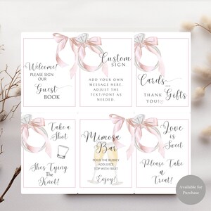 May include: Set of 6 printable bridal shower signs with pink and white watercolor rings and text. The signs include: Welcome, Guest Book, Custom Sign, Cards and Gifts, Take a Shot, Shes Tying the Knot, Mimosa Bar, Love is Sweet, Please Take a Treat.