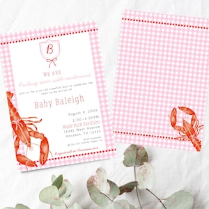 May include: Pink and white gingham baby shower invitations with a red border and a watercolor crawfish illustration. The invitation includes the text "Baby Baleigh" and event details.