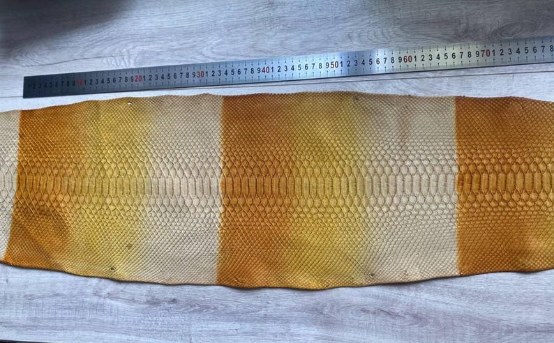 Italian tanned python leather with cream honey and caramel tones