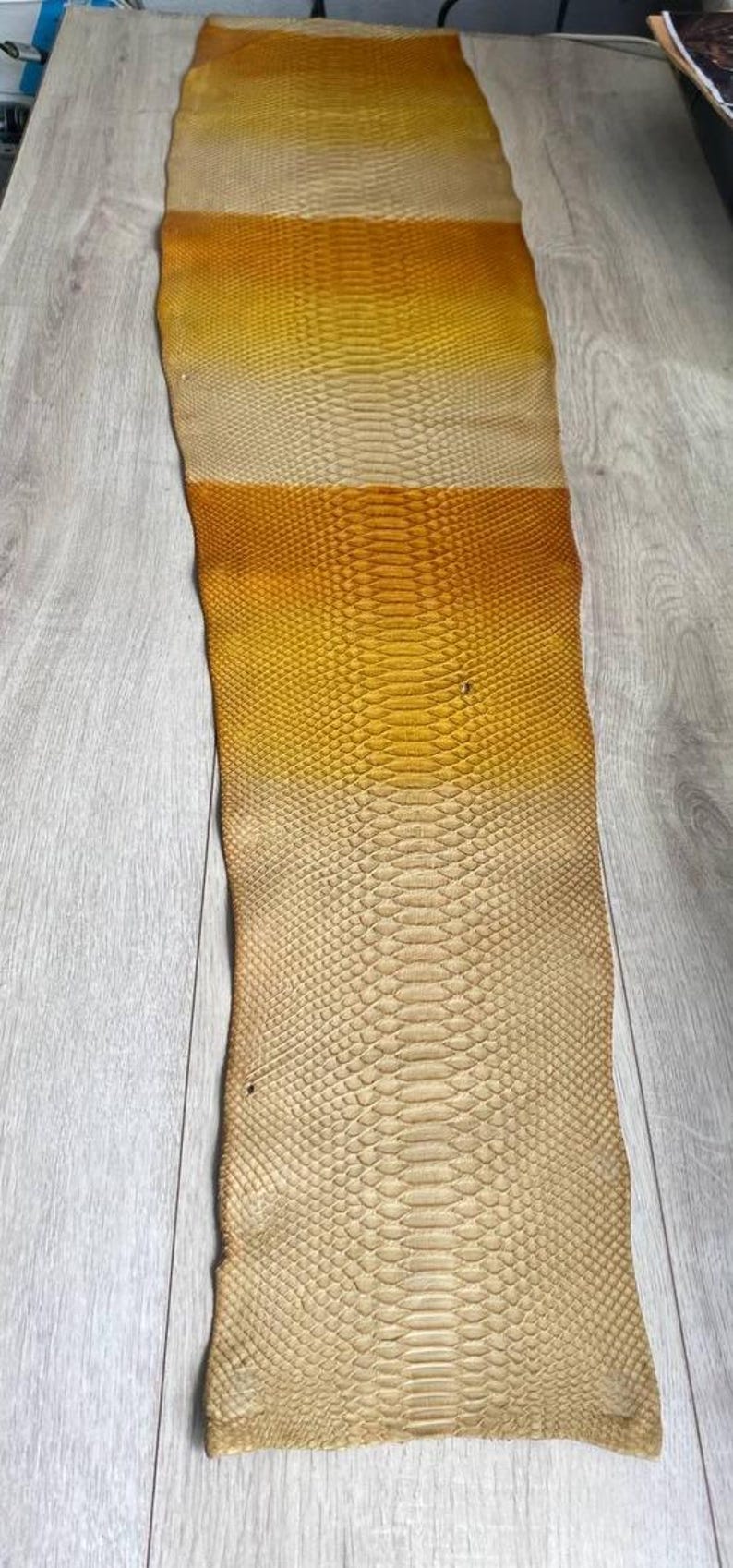 Flexible gradient python leather for bespoke leather accessories