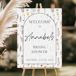 Letrero de bienvenida personalizado con flores silvestres para despedida de soltera, impreso en cartón pluma, lienzo o póster. Bonito tablero de bienvenida floral para fiesta de brunch nupcial.