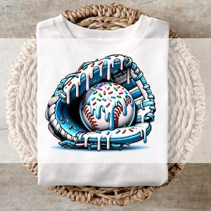 May include: A white t-shirt with a graphic of a baseball mitt and baseball covered in blue and white frosting and colorful sprinkles.