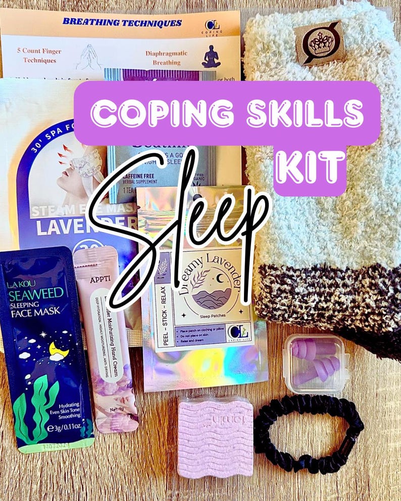 May include: A sleep kit containing items for relaxation and stress relief. The kit includes a lavender face mask, sleep patches, earplugs, a hair tie, and a lavender-scented soap. Also included are fuzzy socks and a booklet on breathing techniques. The text "COPING SKILLS KIT" is visible.