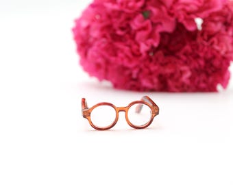 Gafas en miniatura