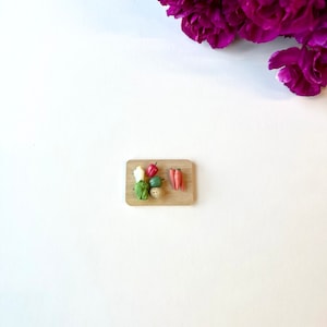 Mini Vegetables on Cutting Board