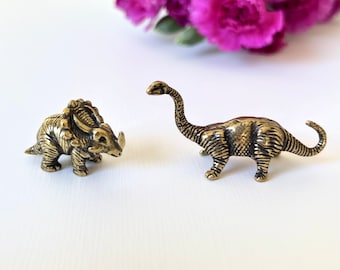 Juego de 2 figuras de dinosaurio de latón