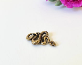 Figura de serpiente de latón