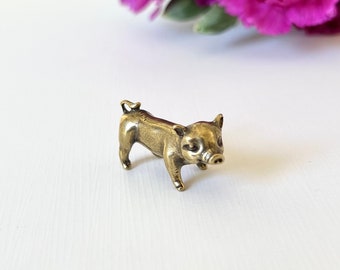 Figura de cerdo de latón