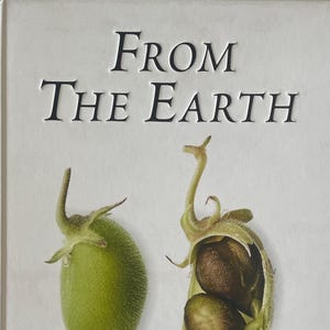 May include: A book cover titled "From The Earth" with embossed black lettering. The cover features two illustrations of vegetables, one green and one with brown seeds. The text below reads "World's Great, Rare and Almost Forgotten Vegetables" by Peter Gilmore.