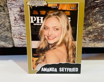 Tarjeta coleccionable dorada de Amanda Seyfried n.° 38