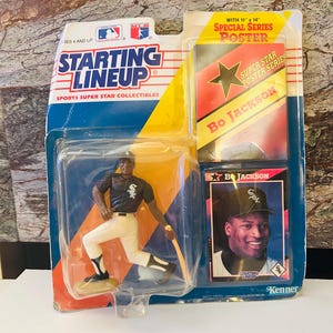 May include: A vintage "Starting Lineup" action figure of Bo Jackson in a Chicago White Sox uniform, packaged with a poster and trading card. The packaging is blue, yellow, and red, with the text "Starting Lineup" and "Sports Super Star Collectibles".