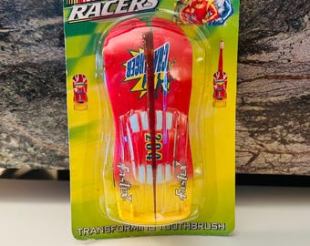 Zabawka Happy Meal z transformującą się szczoteczką do zębów Nascar Racers z 2000 roku