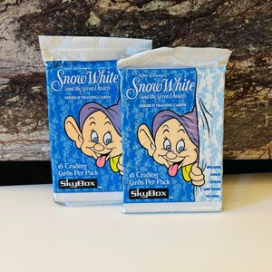 Dos paquetes de cartas coleccionables de Blancanieves de 1994
